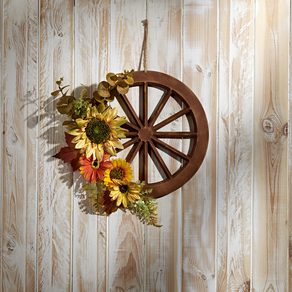 Pagen Blumenarrangement Holzrad
