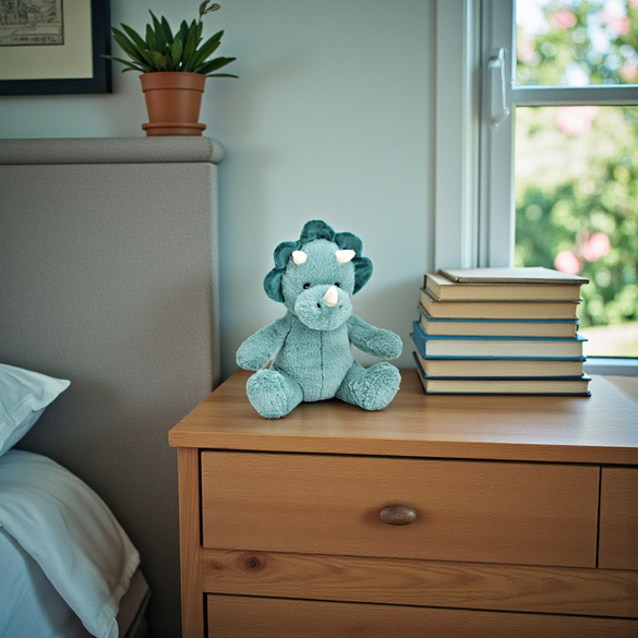 Stofftier "Dino" türkis