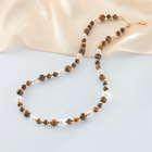 Muschelkette mit Tigerauge