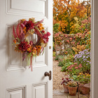 Türkranz Herbstgesteck auf Rattan Eldo