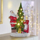 Mr. & Mrs. Santa unterm Weihnachtsbaum